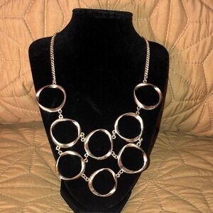 Gold tone link necklace.